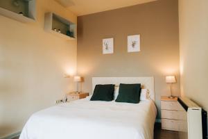 A bed or beds in a room at Apartamentos Stetic