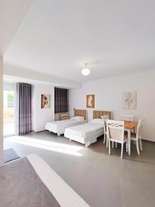 Postel nebo postele na pokoji v ubytování Comfort Villa