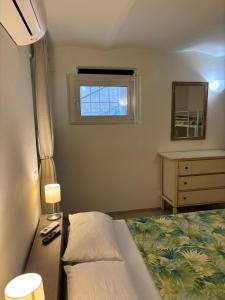 Letto o letti in una camera di Scalette Via Elia