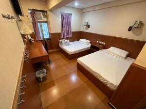 Voodi või voodid majutusasutuse HK Peaceful Guesthouse toas