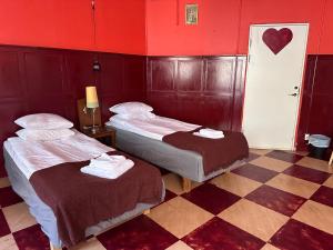 Ένα ή περισσότερα κρεβάτια σε δωμάτιο στο Reimersholme Hotel