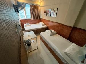 Voodi või voodid majutusasutuse HK Peaceful Guesthouse toas