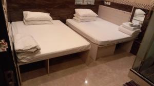 Ένα ή περισσότερα κρεβάτια σε δωμάτιο στο HK Peaceful Guesthouse