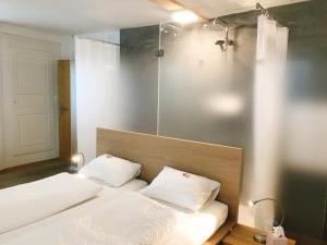 Postel nebo postele na pokoji v ubytování Gasthaus Schöntal