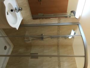 Koupelna v ubytování Mara Apartman