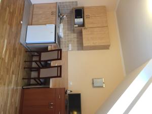Kuchyň nebo kuchyňský kout v ubytování Mara Apartman