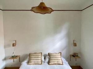 Postel nebo postele na pokoji v ubytování Yacumama Guesthouse + 37 fotografií