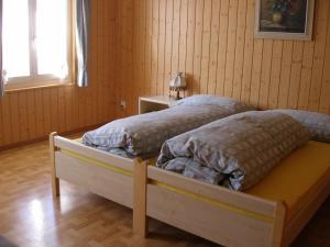 Postel nebo postele na pokoji v ubytování Gasthof Rössli