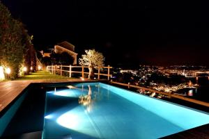 Бассейн в In Costa Relais & Luxury Suites или поблизости