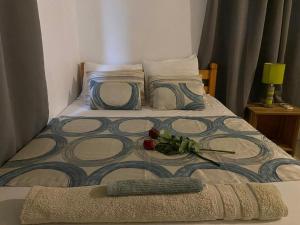 Postel nebo postele na pokoji v ubytování Le Kato Luxx