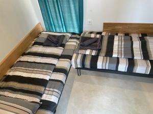 Ένα ή περισσότερα κρεβάτια σε δωμάτιο στο Krum's Little Secret Villa