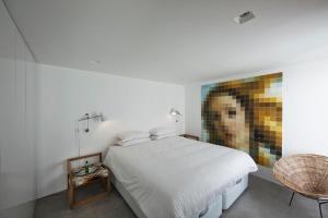 Ένα ή περισσότερα κρεβάτια σε δωμάτιο στο Casa Xonar