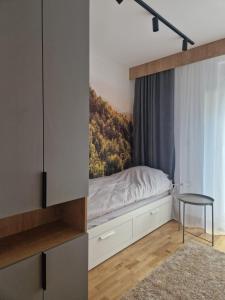 Łóżko lub łóżka w pokoju w obiekcie Divčigora apartmani
