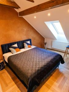 Postel nebo postele na pokoji v ubytování Apartmán Podzámčí