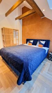 Ein Bett oder Betten in einem Zimmer der Unterkunft Apartmán Podzámčí