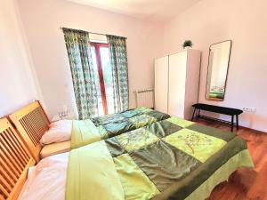 Postel nebo postele na pokoji v ubytování House Fran