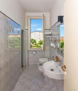 Koupelna v ubytování Hotel Apuana