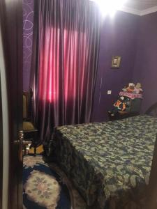 Postel nebo postele na pokoji v ubytování Pirosmani House