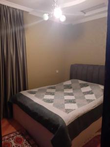 Postel nebo postele na pokoji v ubytování Pirosmani House