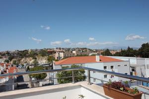 a view of the city from the balcony of a apartment at Bonapart Hotel in Çeşme