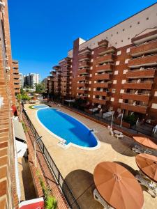 Bazén v ubytování Playa Coral II 3 Nº 1054 nebo v jeho okolí