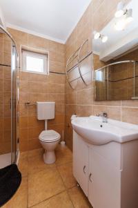 Koupelna v ubytování Apartments Stašić Katarina + 37 fotografií