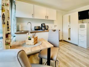 Kuchyň nebo kuchyňský kout v ubytování Möwennest App 1