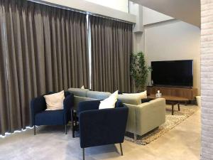 TV a/nebo společenská místnost v ubytování luxury apartment in boulevard
