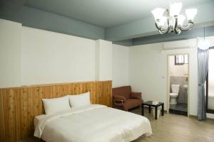 Ένα ή περισσότερα κρεβάτια σε δωμάτιο στο Didi House