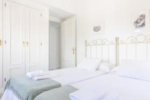 Ένα ή περισσότερα κρεβάτια σε δωμάτιο στο Apartamento con terraza en Playa de Regla 6