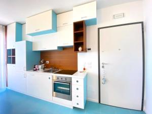 Kuchyň nebo kuchyňský kout v ubytování V12 Apartments Puglia Polignano a Mare