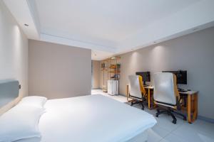Foto sihtkohas Nanjing asuva majutusasutuse 网鱼电竞酒店（竹山路地铁站店） galeriist