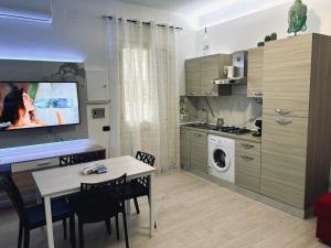 A kitchen or kitchenette at Casa Sant'Anna