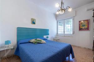 Ένα ή περισσότερα κρεβάτια σε δωμάτιο στο Villa Marechiaro fronte mare Rive del Salento