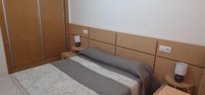 Postel nebo postele na pokoji v ubytování Costa Azahar II Nº1055
