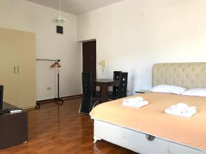 Postel nebo postele na pokoji v ubytování Vila Oaza Markovici