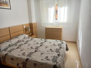 Ein Bett oder Betten in einem Zimmer der Unterkunft Costa Azahar II Nº 1041
