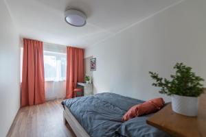 Postel nebo postele na pokoji v ubytování Kalda apartment