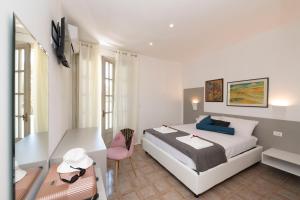 Postel nebo postele na pokoji v ubytování B&B D'Amely