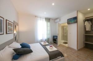 Postel nebo postele na pokoji v ubytování B&B D'Amely