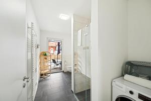 Ett badrum på Salí Homes R4 - hochwertiges Apartment mit Terrasse