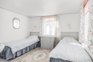 Postel nebo postele na pokoji v ubytování Gillet i Borgholm