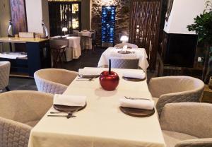 A restaurant or other place to eat at Restaurante & Hotel Rural El Mirador de Trevejo,ideal para parejas