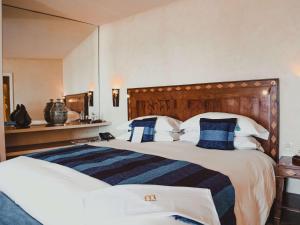 Ліжко або ліжка в номері Le Médina Essaouira Thalassa Sea & Spa - MGallery Collection