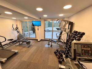 a gym with two treadmills and two tread machines at ibis Styles Montevideo Biarritz in Montevideo