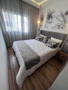 Ένα ή περισσότερα κρεβάτια σε δωμάτιο στο Charmant appartement 2 chambres à Casablanca, à 10 min de la plage