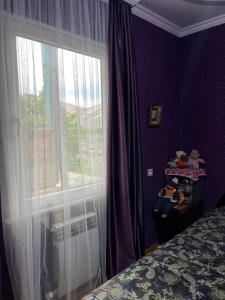 Postel nebo postele na pokoji v ubytování Pirosmani House