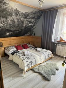 Łóżko lub łóżka w pokoju w obiekcie Zakopianskie Pokoje u Eweliny
