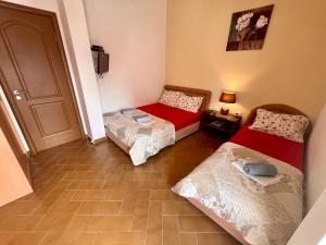 Postel nebo postele na pokoji v ubytování Guesthouse Civovic