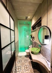 a bathroom with a shower and a toilet and a sink at Meri Boutique Hotel in Korçë